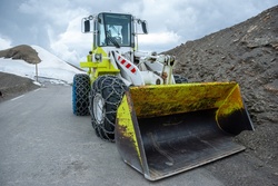 A snowplow used to clear the snow on the mountain roads, Col de la Bonette in the French Alps.