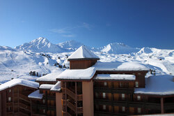 Hotel in Belle Plagne with mountains in winter 