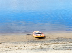Waterfront landscape with a kayak in Aguanish, Quebec, Canada