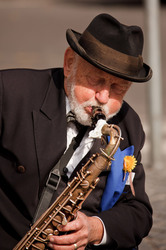 Older gentleman playing saxophone