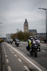 Motorcycles precede the road cycling race, departure in Oudenaarde, Belgium, Tour of Flanders