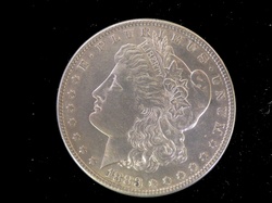 Morgan dollar obverse isolated on black background