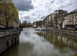 Historic buildings bordering a canal in Ghent, Belgium
