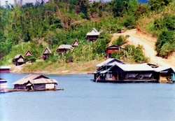 The so-called Mon Village is a village built on the edge of an artificial lake in Sangkhaburi or Sangkhla Buri, Thailand, by Mon people, originally refugees from Myanmar