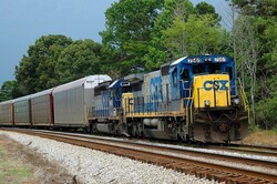 Diesel train moving along the tracks Georgia, USA.