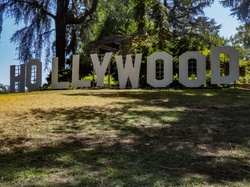 Mock-up of the Hollywood sign in a grassy knoll