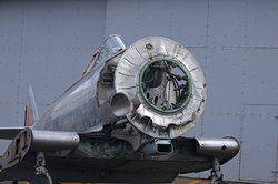 Part of a radial engine aircraft with engine removed on display