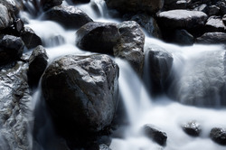 A waterfall among rocks