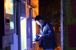 Man using a ATM