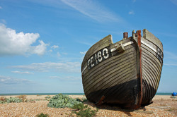 Big massive wooden fishing boat on the beach image