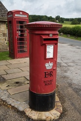 A traditional British postal box. Isolated with path