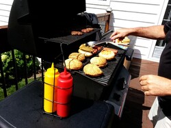 Sausages and Beefburgers on a BBQ