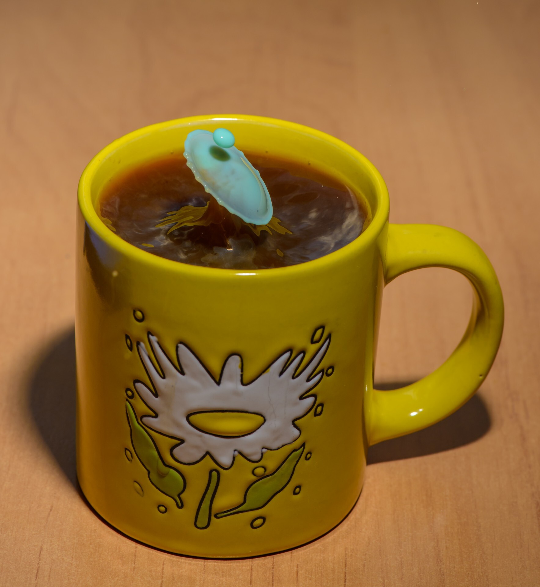 The impact of drops of milk into coffee