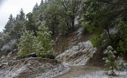 Dirt road winding into mountains in Oregon