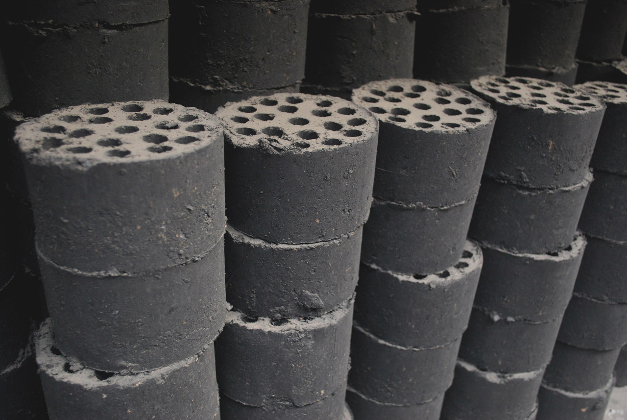 Stack of Chinese coal bricks,used to heat stoves