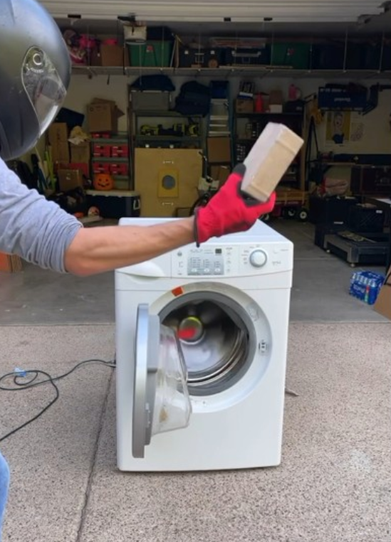 Throwing a brick in a washing machine