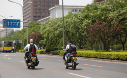 Motorcyles on Chang An Jie in Beijing 