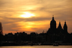 Silhouette of Amsterdam in sunset