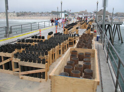 Preparations for annual 4th of July fireworks display on Huntington Beach Pier