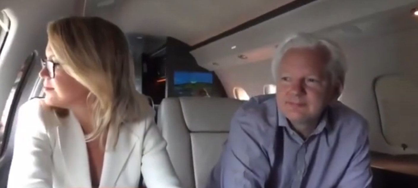Assange on plane
